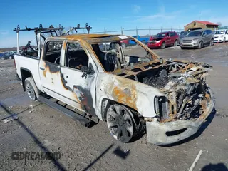 2018 GMC Sierra 1500 Denali z VIN 3GTU2PEJXJG459376, wystawiony jako IAAI lot #41608966 z przebiegiem 91 000 mil mil oraz . Historia ofert i sprzedaży dostępna na DreamBid. Obrazek 1.