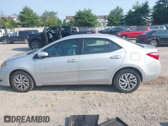 2018 Toyota Corolla L with VIN 2T1BURHE6JC100175, listed as a IAAI auction lot 42405737 with 123,183 mi miles and . Bid and sale history available at DreamBid. Image 14.