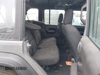 2022 Jeep Wrangler Unlimited High Tide with VIN 1C4HJXDG8NW126143, listed as a IAAI auction lot 41507703 with 44,472 mi miles and . Bid and sale history available at DreamBid. Image 8.