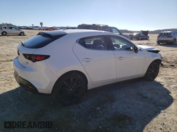 2022 Mazda Mazda3 Hatchback Premium with VIN JM1BPAML2N1518904, listed as a Copart auction lot 36747253 with 4,927 mi miles. Bid and sale history available at carsss.com. Image 3.