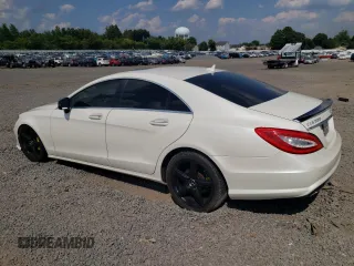 2014 Mercedes-Benz CLS-Class CLS 550 with VIN WDDLJ9BB9EA117290, listed as a Copart auction lot 68517414 with 98,705 mi miles and Salvage Title. Bid and sale history available at carsss.com. Image 2.