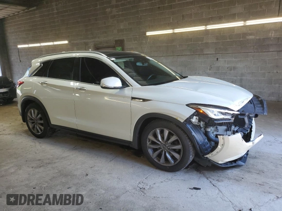 2020 Infiniti QX50 Luxe with VIN 3PCAJ5M3XLF112054, listed as a Copart auction lot 58483235 with 49,815 mi miles and Salvage title. Bid and sale history available at DreamBid. Image 4.