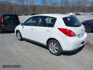 2009 Nissan Versa 1.8 SL with VIN 3N1BC13E19L404019, listed as a IAAI auction lot 41872871 with 192,158 mi miles. Bid and sale history available at carsss.com. Image 3.