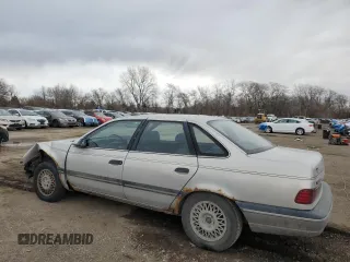 1991 Ford Taurus with VIN 1FACP52U9MG101093, listed as a Copart auction lot 45948105 with 594,696 mi miles and Salvage title. Bid and sale history available at DreamBid. Image 2.