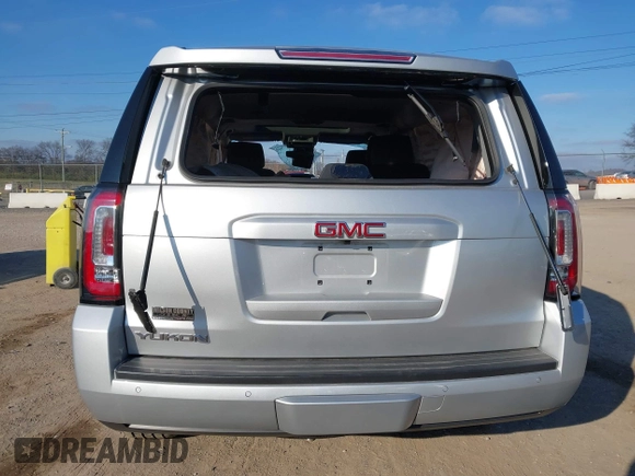 2020 GMC Yukon SLT Standard Edition with VIN 1GKS2DKCXLR294027, listed as a IAAI auction lot 41004965 with 69,161 mi miles. Bid and sale history available at carsss.com. Image 16.