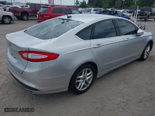 2013 Ford Fusion SE with VIN 3FA6P0HR9DR132114, listed as a IAAI auction lot 42007445 with 133,769 mi miles. Bid and sale history available at carsss.com. Image 4.