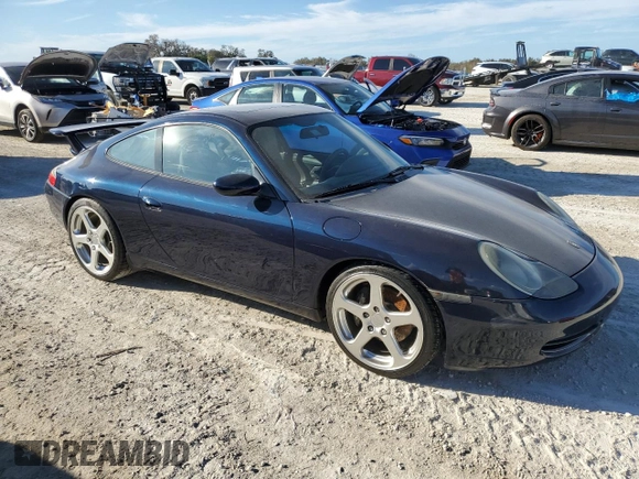 2000 Porsche 911 z VIN WP0AA2996YS621130, wystawiony jako Copart lot #77096434 z przebiegiem Nie podano mil oraz Szkoda całkowita • Salvage title. Historia ofert i sprzedaży dostępna na DreamBid. Obrazek 4.