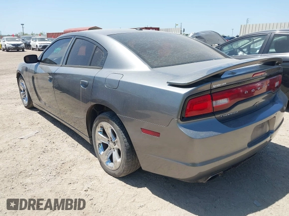 2012 Dodge Charger SE with VIN 2C3CDXBG5CH219805, listed as a IAAI auction lot 42002071 with 238,820 mi miles. Bid and sale history available at carsss.com. Image 3.