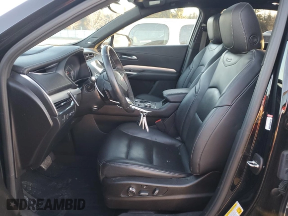 2022 Cadillac XT4 AWD Premium Luxury with VIN 1GYFZDR45NF109999, listed as a Copart auction lot 84618914 with 66,697 mi miles and Clean title. Bid and sale history available at DreamBid. Image 7.