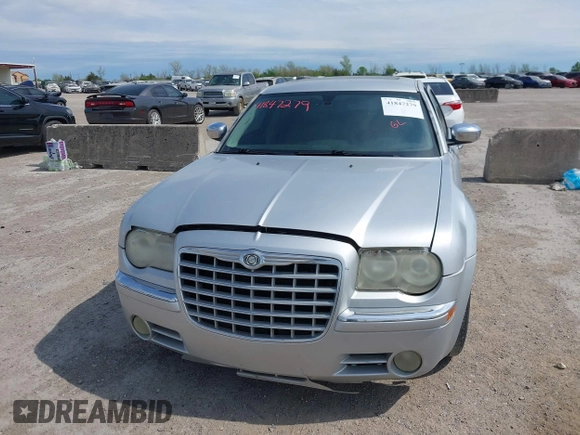 2005 Chrysler 300 with VIN 2C3JA63H05H693522, listed as a IAAI auction lot 41847279 with 162,037 mi miles. Bid and sale history available at carsss.com. Image 12.
