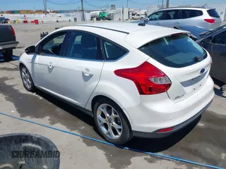 2014 Ford Focus Titanium with VIN 1FADP3N27EL330366, listed as a IAAI auction lot 42719377 with 97,009 mi miles and . Bid and sale history available at DreamBid. Image 3.