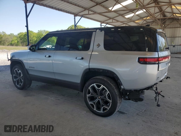 2025 Rivian R1S Adventure z VIN 7PDSGBBA9SN052652, wystawiony jako Copart lot #51659315 z przebiegiem 4012 mil mil oraz Szkody całkowita. Historia ofert i sprzedaży dostępna na DreamBid. Obrazek 2.