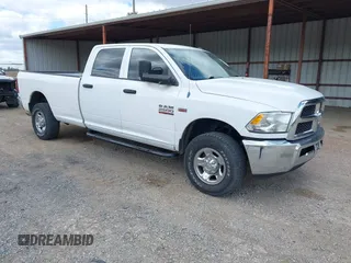 2013 Ram 2500 Tradesman z VIN 3C6TR5HT9DG575642, wystawiony jako IAAI lot #41857815 z przebiegiem 223 929 mil mil oraz . Historia ofert i sprzedaży dostępna na DreamBid. Obrazek 1.