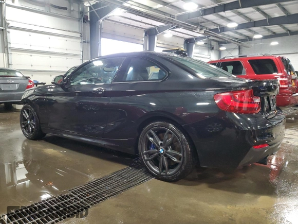 2016 BMW 2 Series M235i xDrive with VIN WBA1J9C5XGV695823, listed as a Copart auction lot 81548364 with 83,149 mi miles and Salvage Title. Bid and sale history available at carsss.com. Image 2.