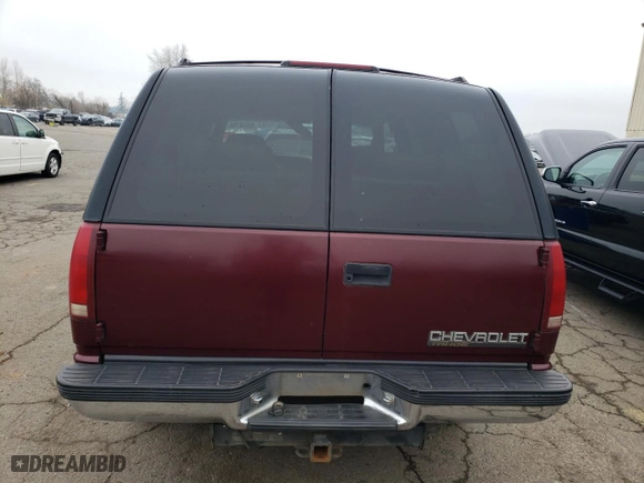 1999 Chevrolet Tahoe Z71 with VIN 1GNEK13R8XJ530020, listed as a Copart auction lot 46325435 with 409,412 mi miles and Salvage Title. Bid and sale history available at carsss.com. Image 6.