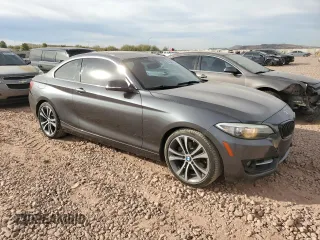 2015 BMW 2 Series 228i with VIN WBA1F5C57FV257639, listed as a Copart auction lot 86645114 with 73,094 mi miles and Salvage Title. Bid and sale history available at carsss.com. Image 4.