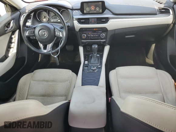 2016 Mazda 6 i Grand Touring with VIN JM1GJ1W5XG1474840, listed as a Copart auction lot 54019355 with 129,760 mi miles and Salvage Title. Bid and sale history available at DreamBid. Image 8.