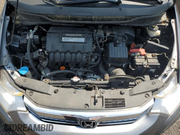 2013 Honda Insight z VIN JHMZE2H31DS000827, wystawiony jako Copart lot #60745645 z przebiegiem 172 694 mil mil oraz Szkoda całkowita • Salvage title. Historia ofert i sprzedaży dostępna na DreamBid. Obrazek 11.