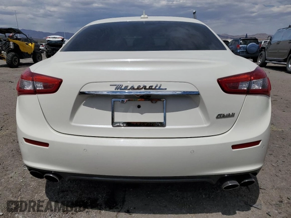 2017 Maserati Ghibli с VIN ZAM57XSA1H1197259, выставлен на аукционе Copart как лот 55272405 с пробегом 37 799 миль миль и Списание • Salvage title. История ставок и продаж доступна на DreamBid. Изображение 6.