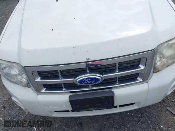 2012 Ford Escape XLT z VIN 1FMCU9D77CKB60829, wystawiony jako IAAI lot #42653677 z przebiegiem 151 116 mil mil oraz . Historia ofert i sprzedaży dostępna na DreamBid. Obrazek 6.