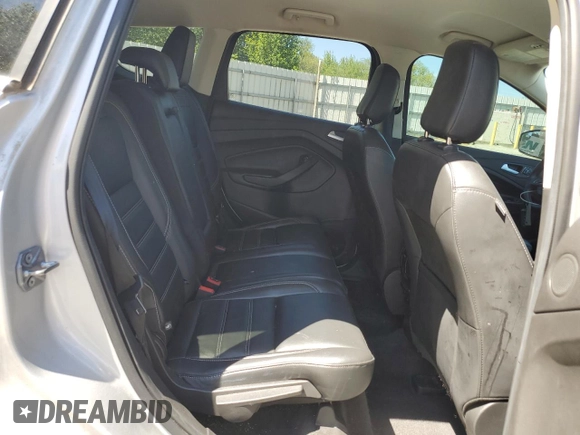 2019 Ford Escape Titanium z VIN 1FMCU0J92KUB62184, wystawiony jako Copart lot #63027765 z przebiegiem 136 005 mil mil oraz Czysty tytuł • Clean title. Historia ofert i sprzedaży dostępna na DreamBid. Obrazek 11.