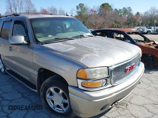 2002 GMC Yukon Denali z VIN 1GKEK63U82J341696, wystawiony jako IAAI lot #41772116 z przebiegiem 259 337 mil mil oraz . Historia ofert i sprzedaży dostępna na DreamBid. Obrazek 6.