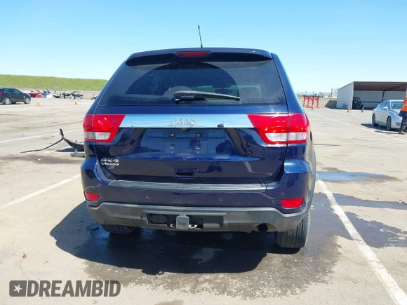 2012 Jeep Grand Cherokee Laredo with VIN 1C4RJFAG0CC160255, listed as a IAAI auction lot 41967809 with 127,702 mi miles. Bid and sale history available at carsss.com. Image 17.