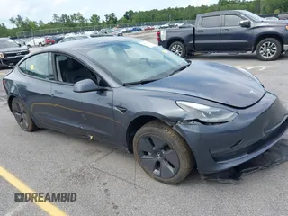 2023 Tesla Model 3 with VIN 5YJ3E1EA1PF449575, listed as a IAAI auction lot 42457119 with 51,084 mi miles and . Bid and sale history available at DreamBid. Image 1.