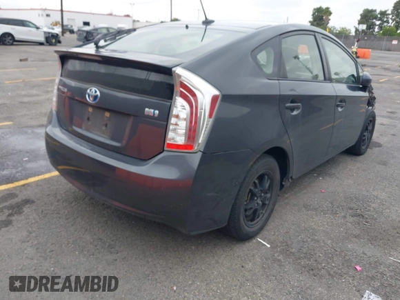 2015 Toyota Prius Four with VIN JTDKN3DU4F1997127, listed as a IAAI auction lot 42194940 with 100,598 mi miles and . Bid and sale history available at DreamBid. Image 4.