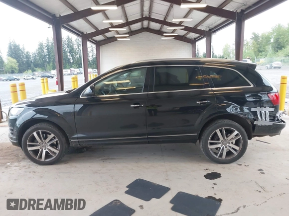 2015 Audi Q7 Premium Plus with VIN WA1LGAFE2FD020974, listed as a IAAI auction lot 42053103 with 107,013 mi miles and . Bid and sale history available at DreamBid. Image 14.