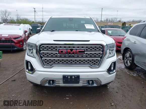 2020 GMC Sierra 1500 Denali with VIN 3GTU9FEL8LG295605, listed as a IAAI auction lot 41922060 with 65,561 mi miles and . Bid and sale history available at DreamBid. Image 12.