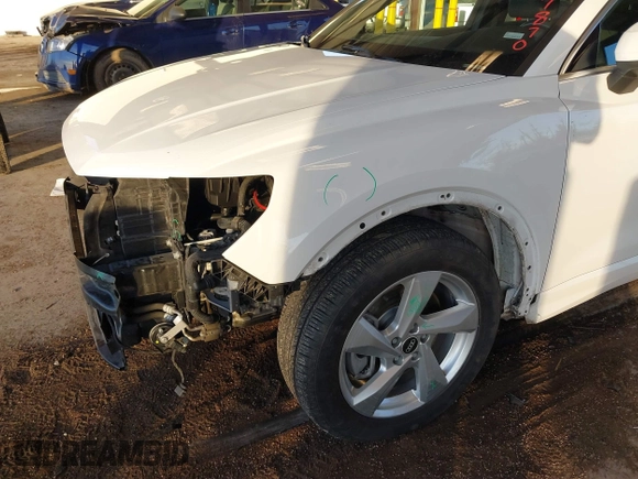 2021 Audi Q3 Premium with VIN WA1AUCF37M1087692, listed as a IAAI auction lot 41277380 with 66,039 mi miles and . Bid and sale history available at DreamBid. Image 6.