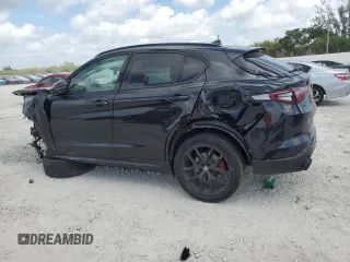 2019 Alfa Romeo Stelvio z VIN ZASPAKAN8K7C49262, wystawiony jako Copart lot #54317625 z przebiegiem Nie podano mil oraz Nie do naprawy • Non repairable. Historia ofert i sprzedaży dostępna na DreamBid. Obrazek 2.
