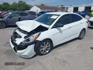 2014 Hyundai Accent GLS with VIN KMHCU4AE6EU766796, listed as a IAAI auction lot 41933743 with 99,142 mi miles. Bid and sale history available at carsss.com. Image 2.