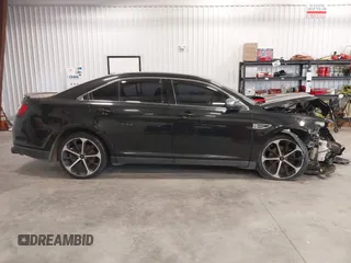 2014 Ford Taurus Limited с VIN 1FAHP2J84EG112559, выставлен на аукционе IAAI как лот 41162048 с пробегом 184 301 миль миль и . История ставок и продаж доступна на DreamBid. Изображение 12.