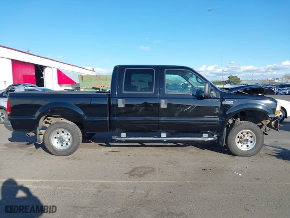 2002 Ford Super Duty F-250 XL with VIN 1FTNW21F22EB74368, listed as a IAAI auction lot 41636544 with 164,604 mi miles. Bid and sale history available at carsss.com. Image 14.