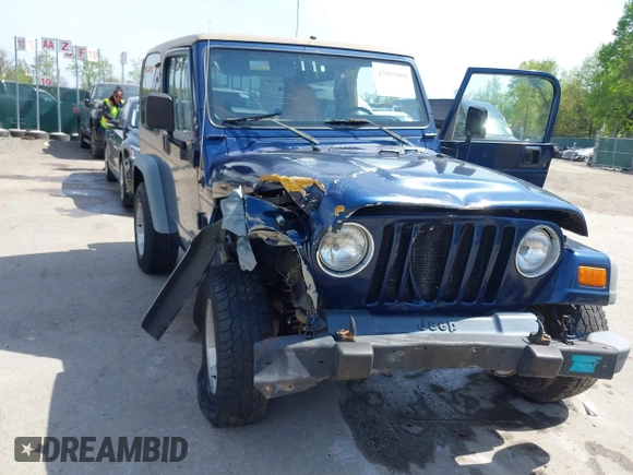 2000 Jeep Wrangler Sport with VIN 1J4FA49S5YP750123, listed as a IAAI auction lot 42060009 with Not Provided miles. Bid and sale history available at carsss.com. Image 6.