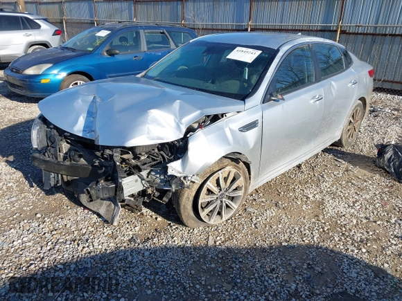 2019 Kia Optima LX with VIN 5XXGT4L35KG359896, listed as a IAAI auction lot 41849243 with 140,975 mi miles. Bid and sale history available at carsss.com. Image 2.