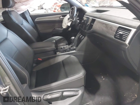 2023 Volkswagen Atlas SE with VIN 1V2KC2CA2PC207030, listed as a IAAI auction lot 42036106 with 38,368 mi miles and . Bid and sale history available at DreamBid. Image 5.