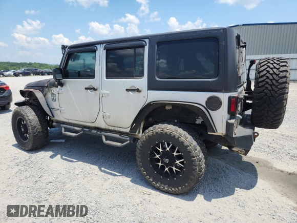 2007 Jeep Wrangler Unlimited Sahara с VIN 1J4GA59167L183198, выставлен на аукционе Copart как лот 62135995 с пробегом Не указан миль и Списание • Salvage title. История ставок и продаж доступна на DreamBid. Изображение 2.