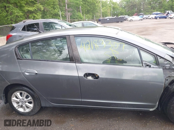 2010 Honda Insight EX with VIN JHMZE2H73AS025856, listed as a IAAI auction lot 42183307 with 71,564 mi miles and . Bid and sale history available at DreamBid. Image 14.