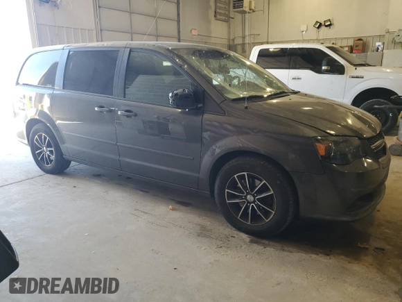 2015 Dodge Grand Caravan SE with VIN 2C4RDGBG6FR668740, listed as a Copart auction lot 50211885 with 129,695 mi miles and Salvage Title. Bid and sale history available at DreamBid. Image 4.