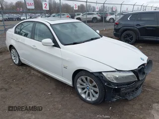 2011 BMW 3 Series 328i xDrive with VIN WBAPK5C55BF122623, listed as a IAAI auction lot 41868600 with 105,948 mi miles. Bid and sale history available at carsss.com. Image 1.
