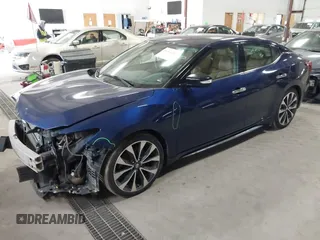 2016 Nissan Maxima SL with VIN 1N4AA6AP6GC425575, listed as a IAAI auction lot 41463093 with 135,920 mi miles and . Bid and sale history available at DreamBid. Image 2.