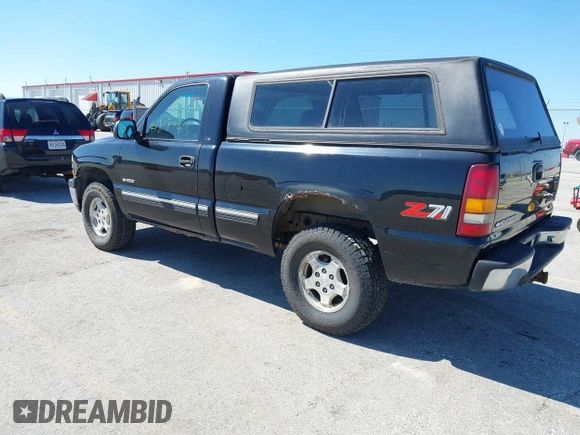 1999 Chevrolet Silverado 1500 LS with VIN 1GCEK14T9XZ213688, listed as a IAAI auction lot 41818993 with 192,743 mi miles. Bid and sale history available at carsss.com. Image 3.