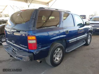 2003 Chevrolet Tahoe LS with VIN 1GNEC13V23R244296, listed as a IAAI auction lot 41999004 with 272,455 mi miles. Bid and sale history available at carsss.com. Image 4.