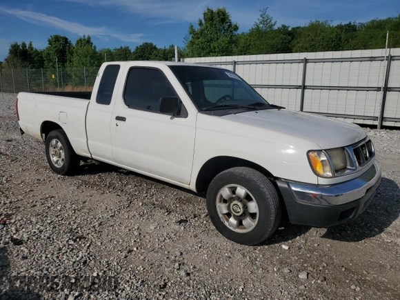1999 Nissan Frontier XE with VIN 1N6DD26S4XC319806, listed as a Copart auction lot 54233635 with 311,759 mi miles and Clean title. Bid and sale history available at DreamBid. Image 4.