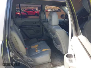 2004 Honda Pilot EX with VIN 2HKYF18514H623272, listed as a IAAI auction lot 42020669 with 186,766 mi miles. Bid and sale history available at carsss.com. Image 8.