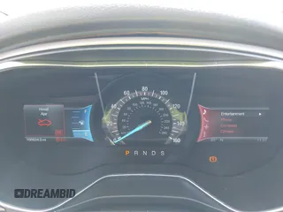 2014 Ford Fusion SE with VIN 3FA6P0HD1ER161452, listed as a IAAI auction lot 42037684 with 166,634 mi miles. Bid and sale history available at carsss.com. Image 7.