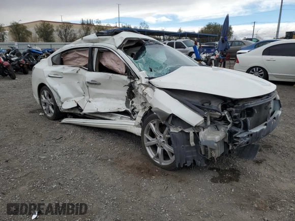 2014 Nissan Maxima SV with VIN 1N4AA5AP0EC471118, listed as a Copart auction lot 49008295 with 98,501 mi miles and Salvage title. Bid and sale history available at DreamBid. Image 4.